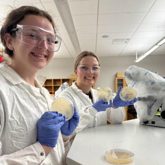 Students participating in research at a health careers camp.
