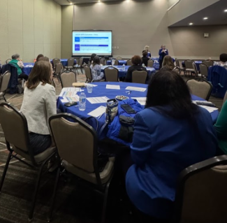 Attendees of the Voluntary Faculty Conference learning in a breakout session