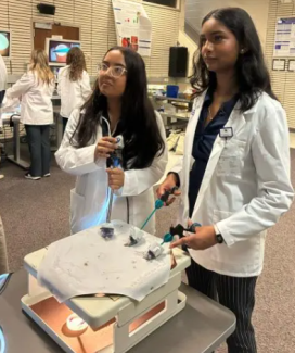 Students in the HRYA camp in the CATS simulation lab practicing laparoscopy. 